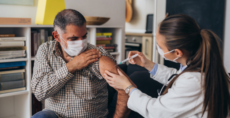 Man receiving Vaccination Man receiving Vaccination