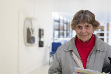 Woman stood in a hospital corridor