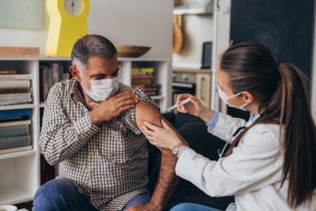 Man receiving Vaccination